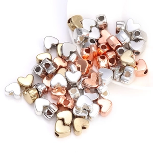 Mix van gouden, zilveren en roségouden hartkralen met grote gaten voor DIY sieraden