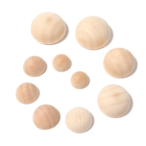 Various sizes of natural unfinished half-round wooden beads for DIY craft projects
