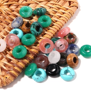 Mix of colorful donut-shaped natural stone beads and charms for DIY jewelry making