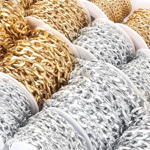 Detailed view of silver and gold Cuban link aluminum chains on rolls for DIY accessories