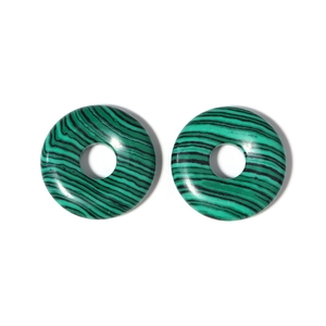 Detail view of round malachite Pi Disc pendants with natural green wavy patterns