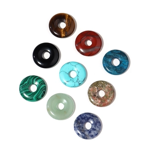 Polished natural stone donut pendants including tiger eye and turquoise for jewelry making