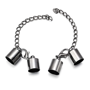 Macro view of gunmetal lobster clasp set with cord caps and extension chain connectors