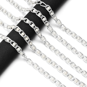 Detailed view of silver metal chain with white faux pearls for DIY bag strap accessories