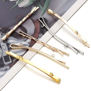 Vista piana di fermagli per capelli DIY placcati oro 14k con ganci in oro e argento