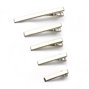 Five assorted sizes of polished silver metal alligator hair clips with serrated edges