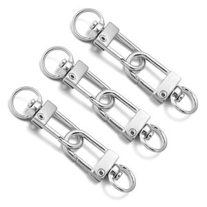 Close-up of three polished zinc alloy swivel lobster clasps for DIY jewelry and keychains
