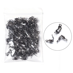 Macro detail of gunmetal clamshell bead tips for DIY jewelry making and bracelet clasp ends