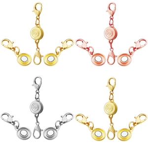 Detail showing magnetic necklace clasps in gold, silver, and rose gold with lobster claws