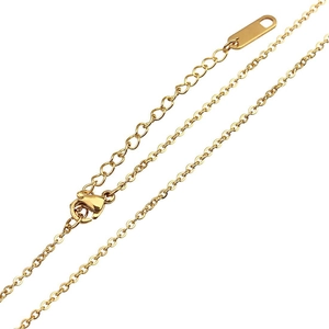 Close-up of golden stainless steel cross chain with lobster clasp and extension