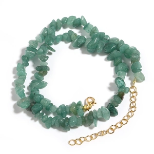 Detail of green irregular natural stone beads necklace with gold lobster clasp