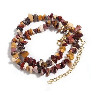 Detailed view of natural agate irregular stone necklace with gold lobster clasp and chain