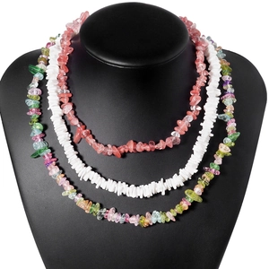 Three-layer stacked necklace featuring colorful irregular crushed stone and white shell pieces