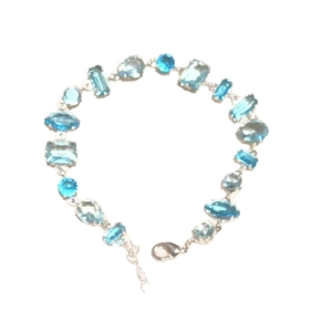 Elegant silver-tone bracelet featuring multi-shape light blue zircon stones for women