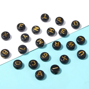 Flat round black acrylic letter beads with gold lettering for DIY bracelet making