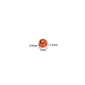 Detailed view of a 7mm orange acrylic smiley face bead with 1.3mm hole for DIY jewelry