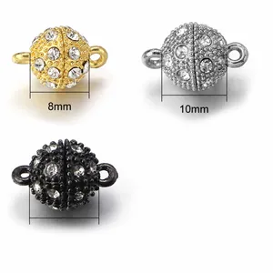 Detail of 8mm and 10mm round rhinestone magnetic clasps for DIY jewelry in gold and silver