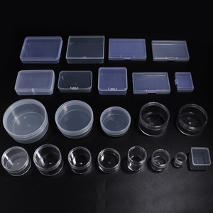 Various transparent PP plastic storage boxes in square and round shapes on black background