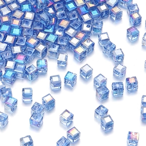 Macro shot of blue iridescent cube glass beads with AB coating for DIY jewelry making