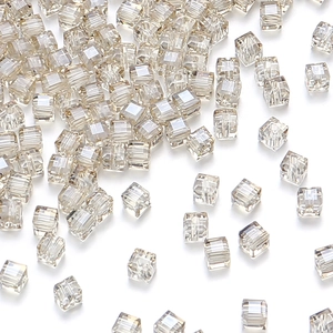 Macro detail of faceted champagne crystal square beads for DIY jewelry making