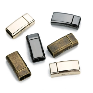 Detailed view of square magnetic clasps for leather bracelets in gold black and bronze