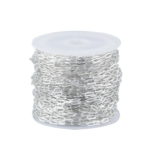 Silver paperclip chain on white spool for DIY jewelry making and necklace crafts