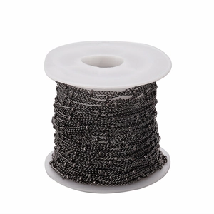 Macro shot of 1.5mm gunmetal finish beaded flat chain on spool for DIY jewelry