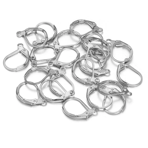 Silver leverback earring hooks for DIY jewelry making stacked on white background