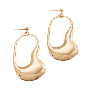 Macro view showing the glossy gold-tone finish of irregular liquid metal geometric drop earrings