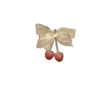 Sweet lace bow hair clip featuring cute pink cherry charms for a charming hair style