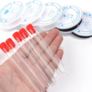 DIY jewelry kit with steel needles in tubes and elastic crystalline strings in various sizes
