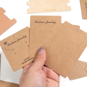 Brown kraft paper jewelry cards with Fashion Jewelry logo for earrings and necklaces