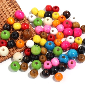 Assortimento di perle in legno di acero colorate con fori grandi per gioielli fai da te