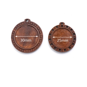 Detail view of 25mm and 30mm vintage wooden pendant trays for DIY jewelry making