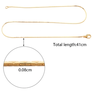 Flat snake bone chain necklace in gold finish with lobster clasp and 41cm length detail