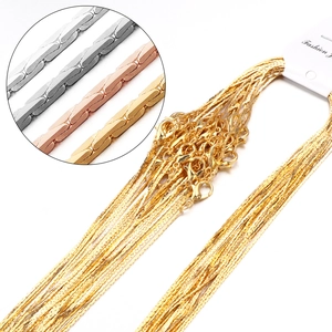 Detailed macro view of flat herringbone snake chains in gold, silver, and rose gold plating