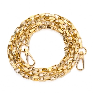 Detail of gold aluminum twill square chain with rotating lobster clasps for DIY crafts