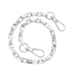 Close-up of silver aluminum square link chain with diagonal texture and lobster clasps