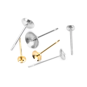 Macro shot of gold and silver stainless steel earring stud bases for DIY jewelry making