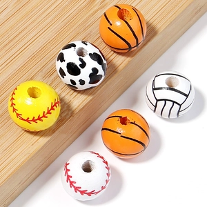 Detailed view of DIY wooden sports beads including basketball, baseball and volleyball