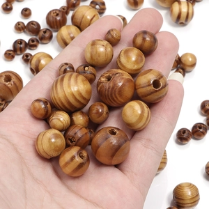 Natural round pine wood beads with tiger stripes in various sizes for DIY craft jewelry