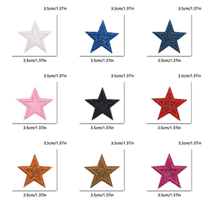 Detailed view of nine colorful 3.5cm sequin star patches with embroidered edges and glitter