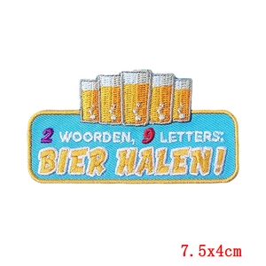 Dutch Carnival beer patch with 2 WOORDEN BIER HALEN embroidery and yellow border