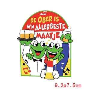 Detail of embroidered cartoon frogs patch with Dutch Carnival theme and beer glasses