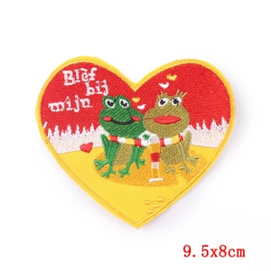 Embroidered heart-shaped patch with two frogs kissing and Dutch text Blijf bij mijn