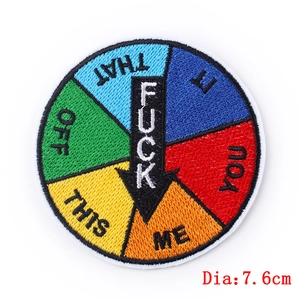 Close-up of a 7.6cm colorful decision wheel embroidery patch with sharp stitching details
