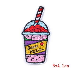 Detail of Brain Freeze embroidered patch with colorful drink design and neat borders