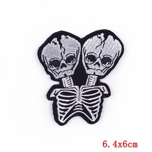 Punk style double-headed skull embroidered patch in black and white, size 6.4x6cm