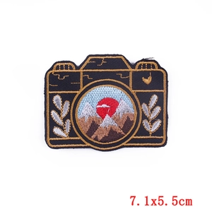 Embroidered camera patch with mountain design, black and gold finish, size 7.1x5.5cm