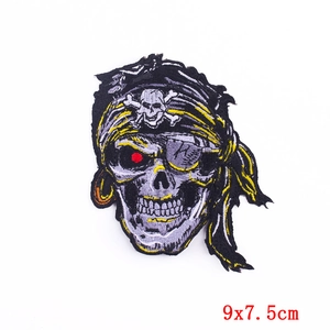 Macro shot of pirate gorilla skull embroidery patch with headscarf, size 9x7.5cm